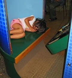 We couldn’t resist…sleeping in the photo booth…