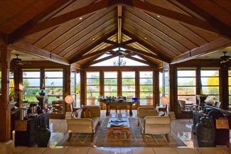The main room and view to the pool and ocean
