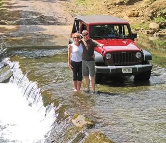 Bev & Carl with our rental crossing the Wailua River