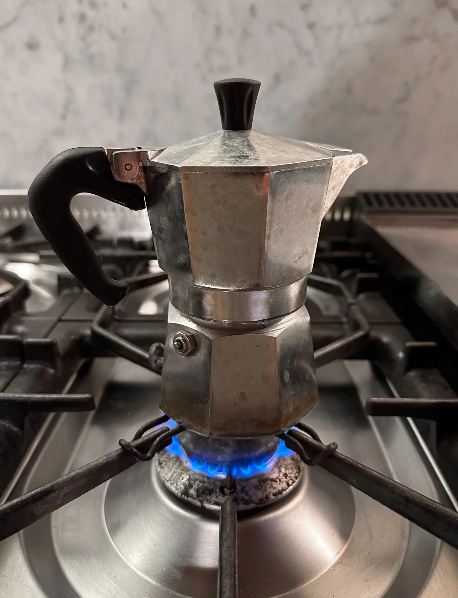 Carl making espresso with the moka pot (not to be confused with mocha).