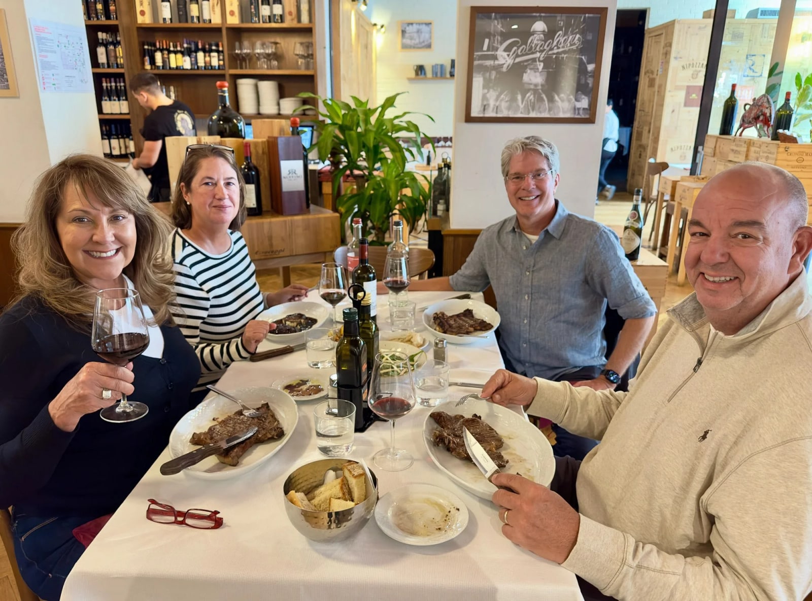 Enjoying a delicious steak dinner at Trattoria Dall’oste.